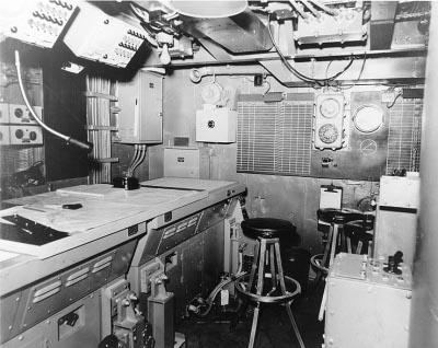 Photograph of cruiser combat information center ca. 1944