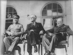 Photograph of Stalin, Roosevelt, and Churchill at the EUREKA conference