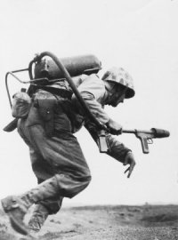 Photograph of Marine on Iwo Jima with flamethrower