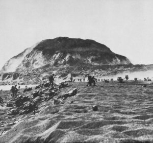 Photograph of Mount Suribachi looming over the landing beaches