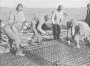 Army engineers laying Marston mat
