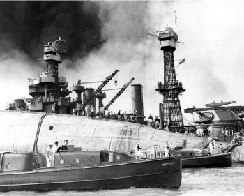 Photograph of U.S.S. Oklahoma capsized in Pearl Harbor