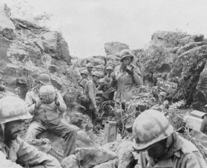 Photograph of Marine command post in cover of a deep gully on Iwo Jima
