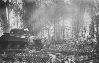 Photograph of tanks and infantry advancing
