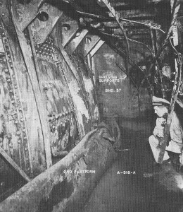 Holding bulkhead dished in by torpedo on USS Nevada