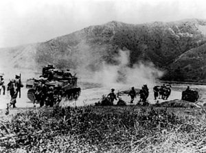 British and Indian troops advance along the Kohima Road