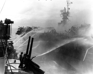 Photograph of damage control efforts on
        USS Princeton