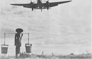 Photograph of air transport and Chinese peasant
