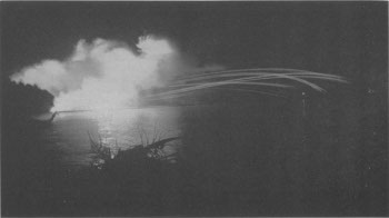 Photograph of naval bombardment at night