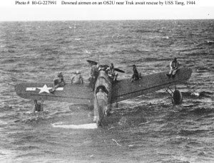 Photograph of OS2U rescuing aviators from Truk lagoon