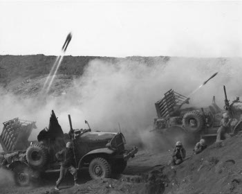 Photograph of Marine rocket jeeps on Iwo
        Jima