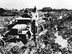 Photograph of truck at Okinawa, stuck in the mud